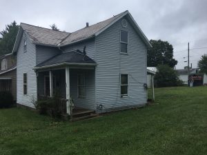 808 Johnson Avenue — blighted house before demolition