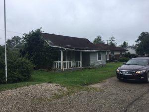 230 East Lincoln Street — blighted house before demolition
